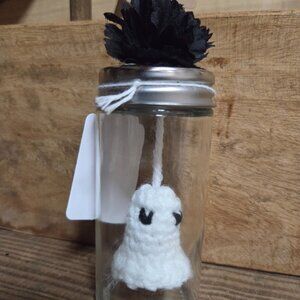 Crochet white ghost in a tall jar